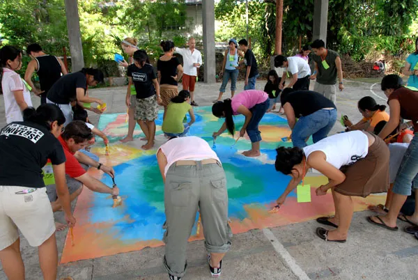 Team members doing circle painting in Cebu